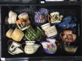 A collection of Torquay mottoware shaving mugs including Watcombe, Longpark etc (2 trays)