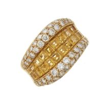 An 18ct gold yellow sapphire and diamond dress ring