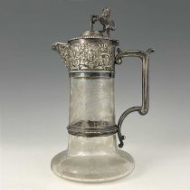 An English Victorian period claret jug, with electroplated mount, the glass body acid etched and