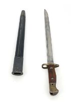 A First World War British 1907 pattern SMLE bayonet by Wilkinson, two piece wooden grip, housed in