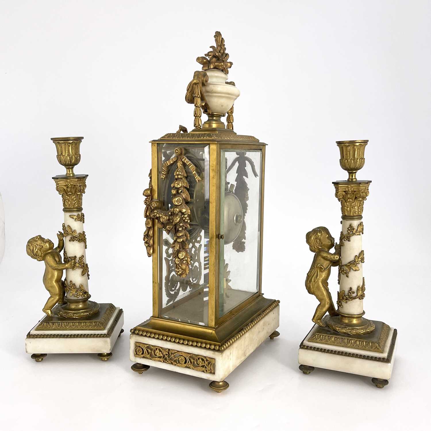 Leroy, Paris, a late 19th Century French clock garniture, gilt metal four-glass case with white - Image 3 of 5