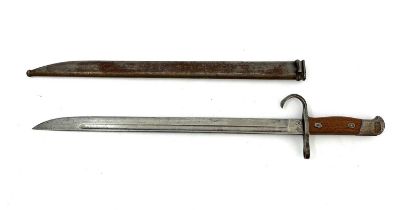 A Japanese Type 30 sword bayonet, two piece wooden grip, housed in steel scabbard, Nagoya Army