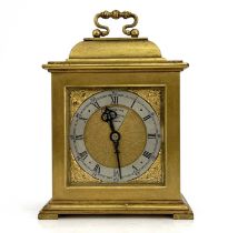 Goldsmiths & Silversmiths, London, a 20th Century boudoir timepiece, brushed brass case in the