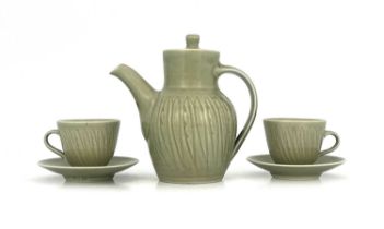 Harry Davis for Crowan Pottery, a studio porcelain coffee pot and two cups and saucers, celadon