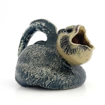 Robert Wallace Martin for Martin Brothers, a grotesque and characterful stoneware rodent jug,