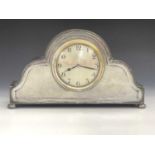Liberty and Co., an Arts and Crafts Tudric pewter clock, model 01492, planished double ogee domed