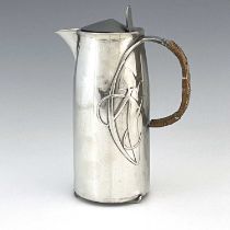 Archibald Knox for Liberty and Co., a Tudric Arts and Crafts pewter hot water jug, model 0231,