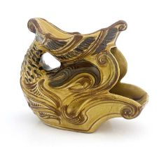 An Aller Vale pottery shaving mug, modelled as a grotesque fish or dolphin, the curved tail fin