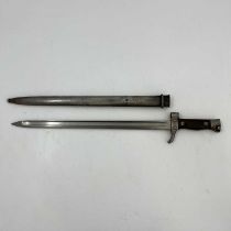 A late 19th century French M1892 Mannlicher Berthier sword bayonet, two piece wooden grip and