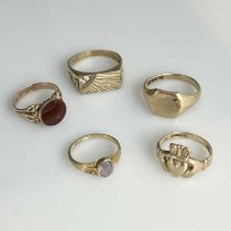 A selection of five gold gem set rings, including an 18ct gold amethyst single stone ring, ring