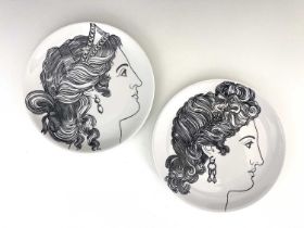 Pierro Fornasetti for Eschenbach, a pair of Le Bellezze plates, circa 1950s, decorated in black with