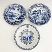 A pair of Dutch Delft Calender plates, April and July, mongorammed verso, and a Dutch Delft portrait