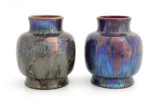 A pair of Dutch iridescent art pottery vases, St Lukas, Utrecht, shouldered ovoid form, marbled