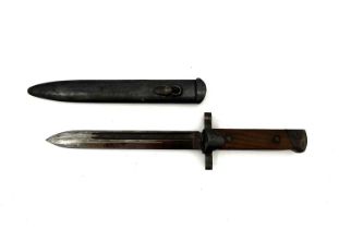 An Italian M1938 Mannlicher-Carcano knife bayonet, two piece wooden grip, housed in blackened