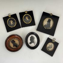 A collection of 18th and 19th century Silhouette type portraits, including women and children,
