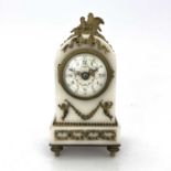 A French boudoir timepiece, circa 1900, arched white marble and ormolu mounted case incorporating