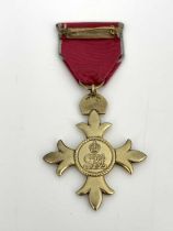 The Most Excellent Order of The British Empire OBE, a George V civilian medal on ribbon, in a fitted