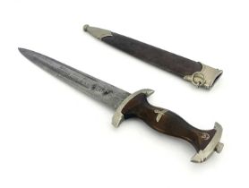 A German WWII SA dagger, by Eickhorn, copper sheath and carved wooden handle inlaid with Third Reich