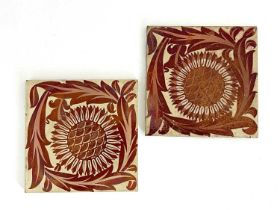 William De Morgan, a pair of red lustre Sunflower tiles, circa 1878, painted on Craven Dunnil and Co