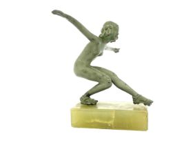 An Art Deco bronze figure, circa 1925, modelled as a nude woman roller skating, verdigris