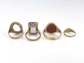 Four gold rings, including carnelian signet ring, amethyst and other signet rings, ring sizes: Z 1/