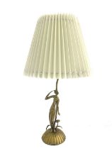 Karl Hagenauer, an Art Deco figural table lamp, circa 1940, modelled as a nude woman on a desert