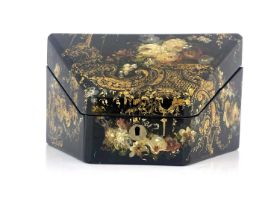 A mid-Victorian papier mache stationery casket, circa 1860, of tapered fall-front form with florally