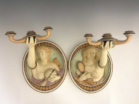 A pair of Minton relief moulded wall sconces, circa 1860s, modelled a allegorical figures of Truth