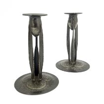 Archibald Knox for Liberty and Co., a pair of Tudric Arts and Crafts pewter candlesticks, model