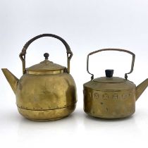 Two Secessionist brass kettles, in the style of WMF, each with rattan top handles (2)