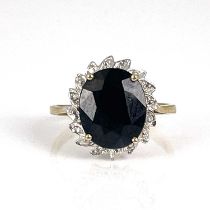 A 9ct gold, sapphire and diamond ring, ring size Q, 3.5g