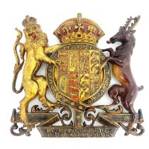 A cast iron and enamelled Royal Warrant, for Queen Mary, circa 1920, with coat or arms and