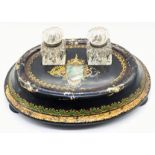 Attributed to Jennens & Bettridge, a Victorian papier mache lacquered inkwell, gold, green and