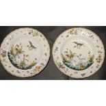 A pair of 19th century porcelain chargers depicting swans and herons, gold floral mark to bases, D.