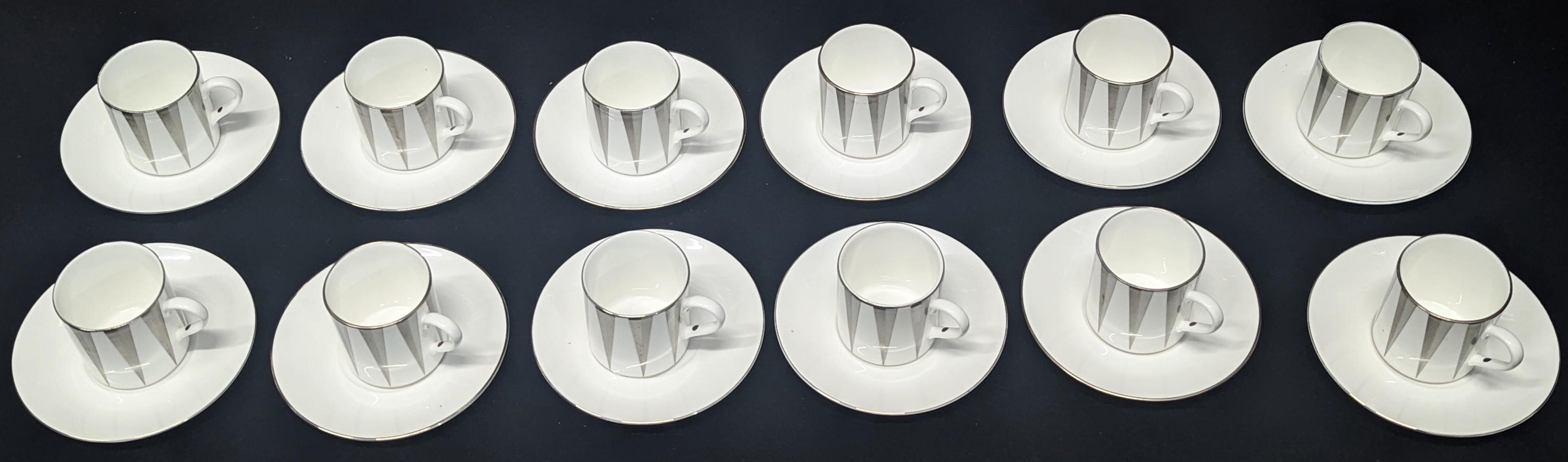 An Asprey of London coffee set, 12 cups and saucers