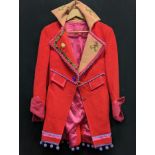 A vintage ladies red coat with mesh lapels and embroidered floral splays