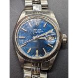 A Rolex ladies Oyster Perpetual Date watch, 6916, 26mm case, dark blue dial, original stainless