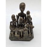 A late 19th century Ashanti Cast Brass Group of villagers celebrating a new born baby, Ashanti or