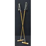 A pair of Aspreys polo sticks