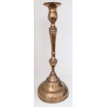 A 19th century Ottoman Turkish brass candlestick,impressed mark to top, H.42cm