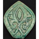 A rare 8-9th century Islamic Umayyad green glazed pottery tile, L.17cm