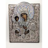 A late 19th century silver Orthodox Icon of the Theotokos with cloisonne enamelled Oklad, indistinct