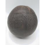 A finely engraved 19th century Persian Qajar coconut huqqa base, D.11cm