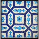 A fine early 19th century North Indian multan tile with geometric designs, 28cm x 28cm