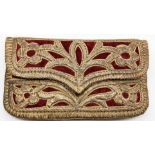 A 19th century Ottoman Turkish metal thread embroidered purse, L.11cm