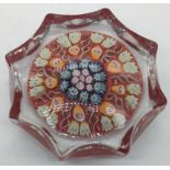 An early 20th century Scottish millefiori glass paperweight