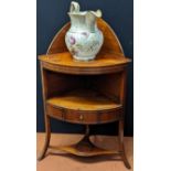 A 19th century mahogany corner cabinet and jug