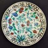 A fine early 17th century Ottoman Turkish iznik dish, H.6cm D.30cm