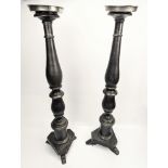 A pair of contemporary wooden candlesticks, H.65cm