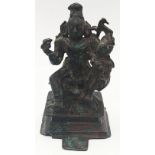 A 17th century Indian bronze of Kali Devi, H.11cm